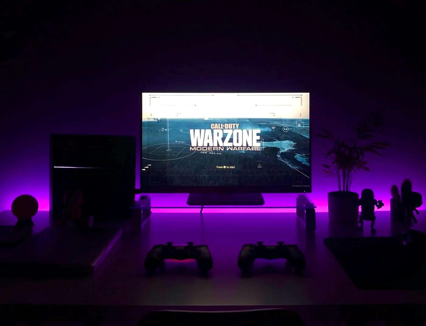 Clean modern gaming desk with desktop PC and monitor